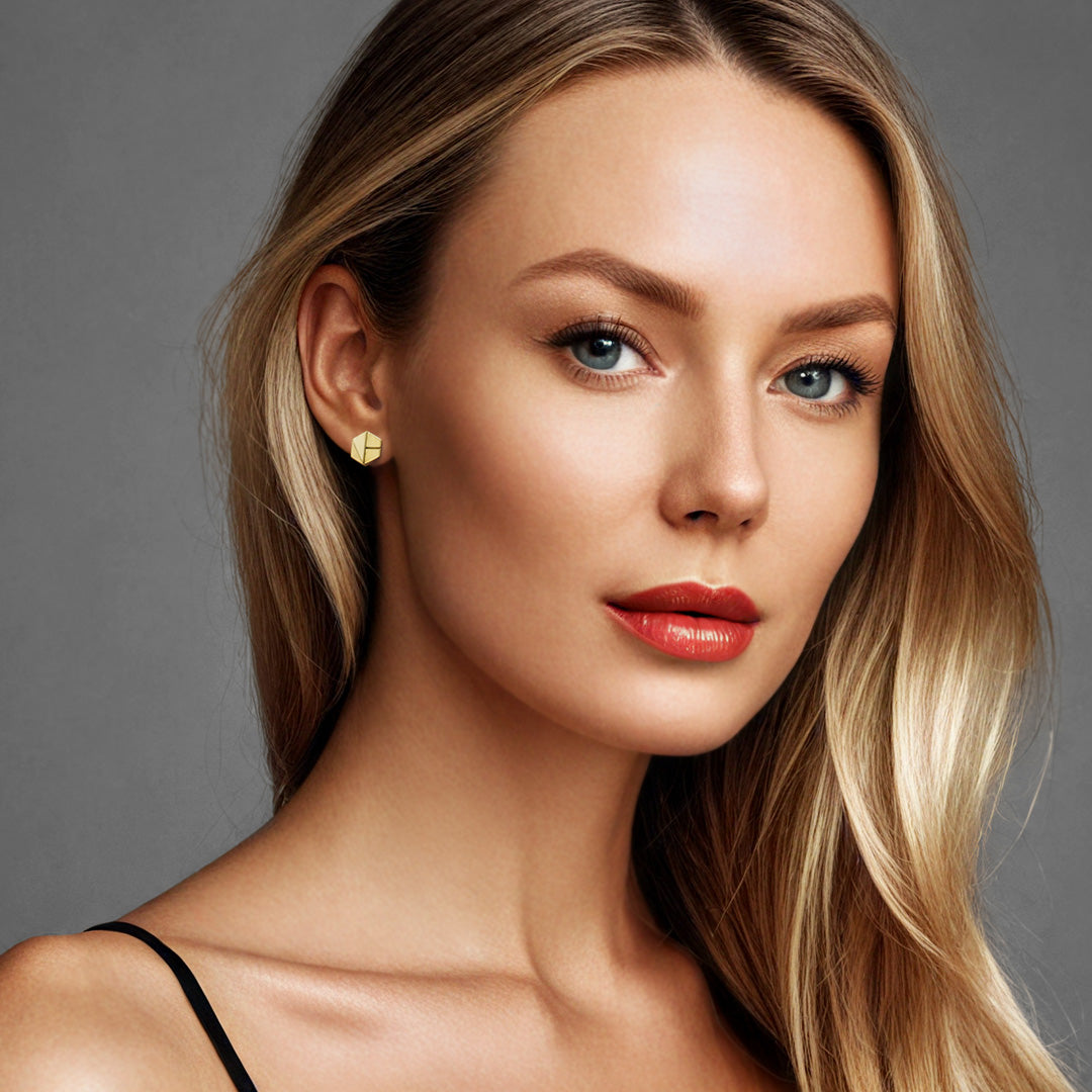 Naude Bourn Hear You stud earrings in 18k yellow gold, crafted by a sustainable brand focusing on recycled gold and bold, refined luxury jewelry design.